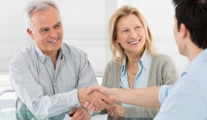 man and woman meeting with attorney