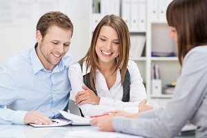 Couple Sitting with Lawyer