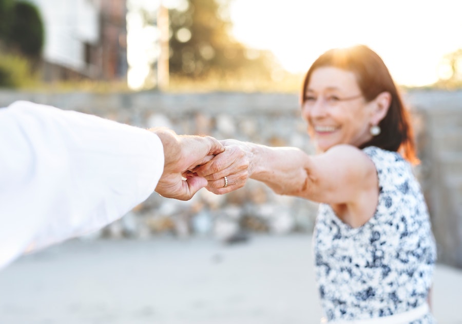 Man and woman holding hands