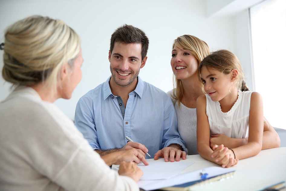 Man and Woman and Child Meeting With Trust Attorney